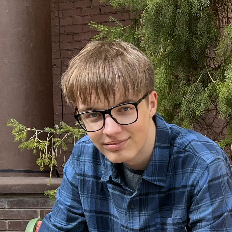 portrait of Brian Dyer, softly smiling towards the camera.